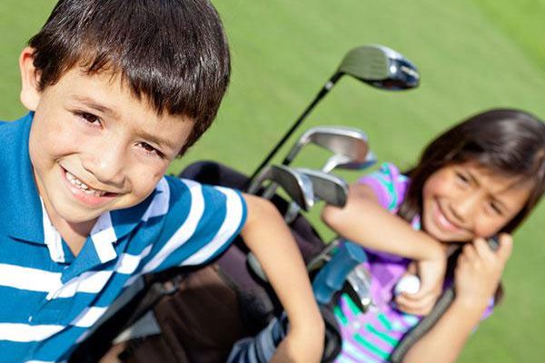 Junior golf boy and girl